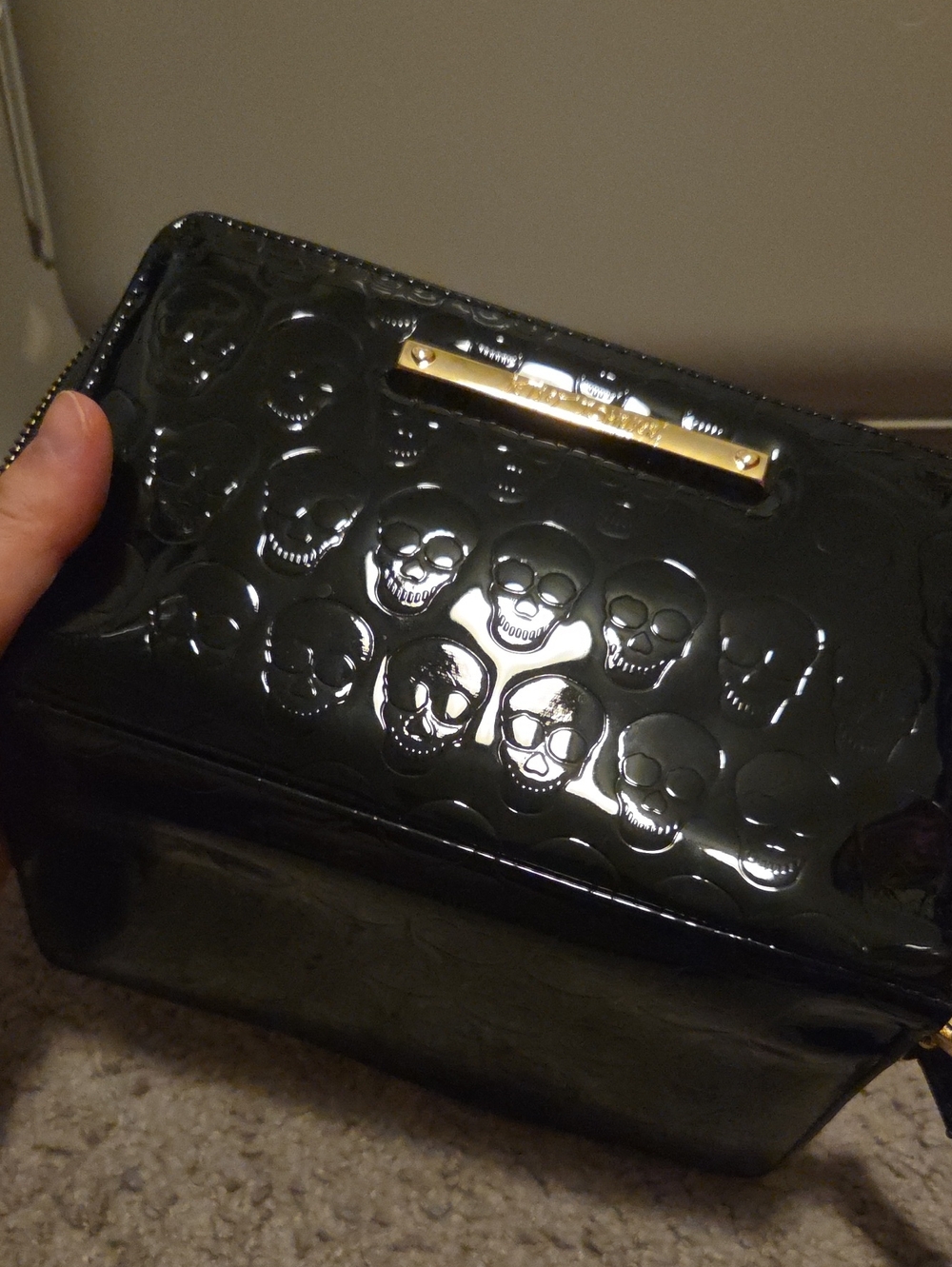 Betsey Johnson Black Monogram Style Wristlet Wallet with Embossed Skull Detail